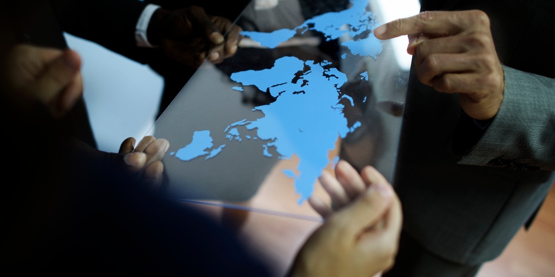 business-team-global-business-planning-working-con-PP7A8V7-1